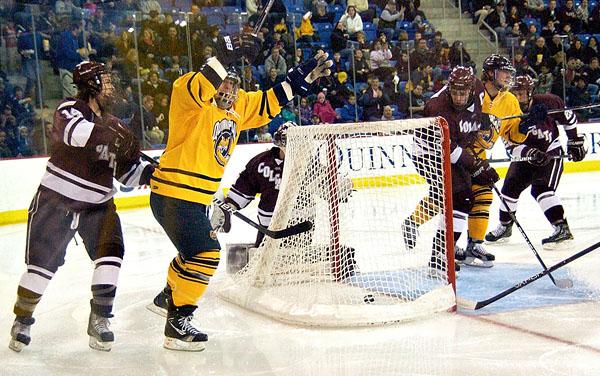 Quinnipiac 7, Colgate 1 The Jones brothers celebrate after a goal in Saturday's game vs. Colgate.