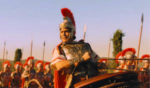 Julius Caesar, played by George Clooney, charges into battle. 