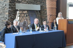 From left to right: Vice President and Dean of Students Monique Drucker, Vice President for Facilities and Capital Planning Salvatore Filardi, Executive Vice President and Provost Mark Thompson, Student Body President Jonathan Atkin, and Student Body Vice President Carly Hviding speak in front of students at the State of the QUnion. 