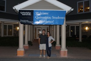 Joe Huberman and Victoria Kozar pose in front of the building they are living in at Ashlar assisted living facility.