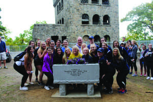 Jackie’s friends and family gather around her bench on the Sleeping Giant.